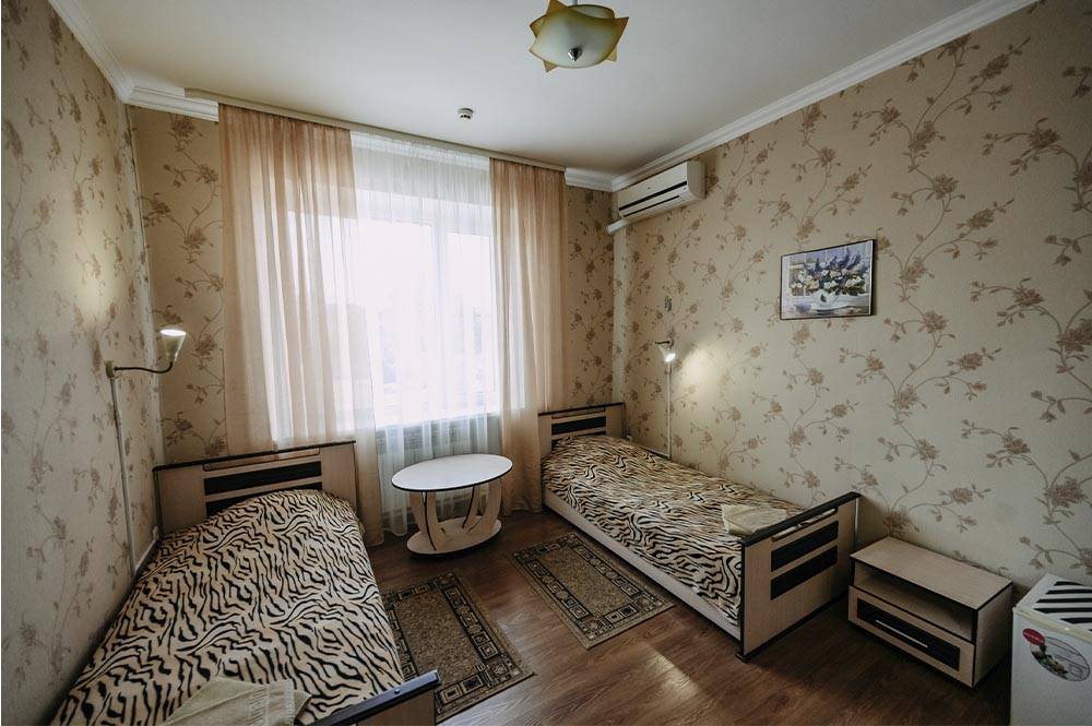 Двухместный номер с двумя односпальными кроватями и удобствами на этаже в Ростовской области